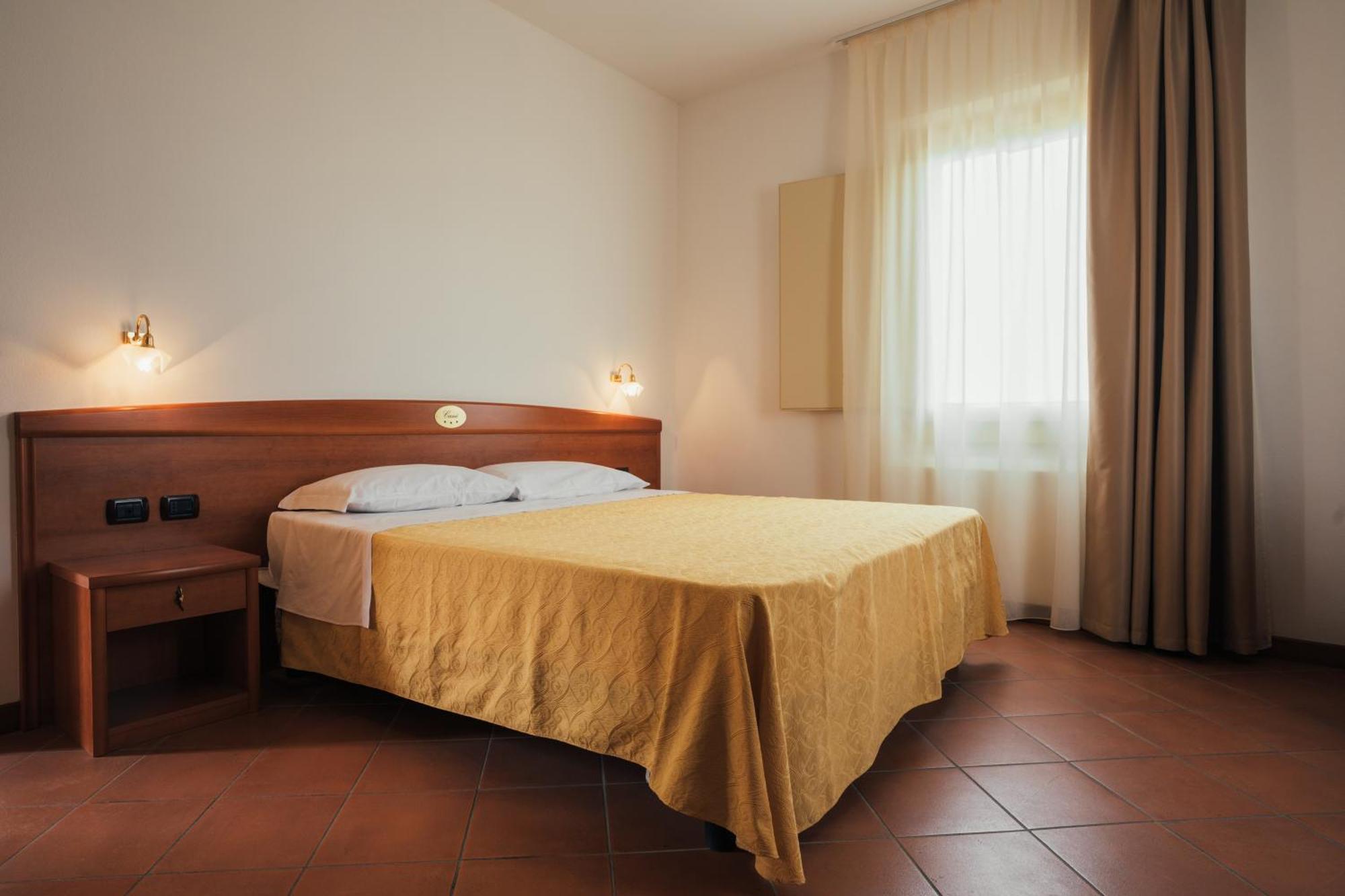 Albergo Cane ดอซซา ภายนอก รูปภาพ