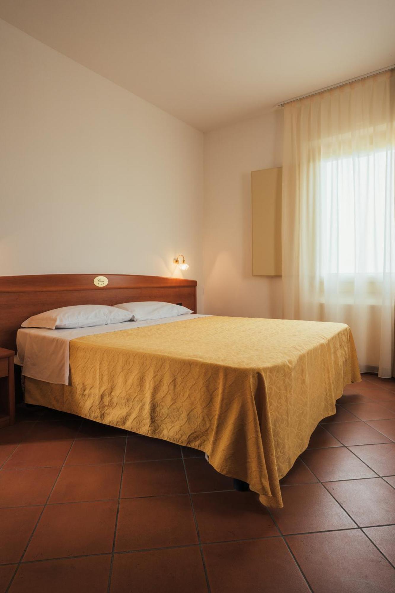 Albergo Cane ดอซซา ภายนอก รูปภาพ