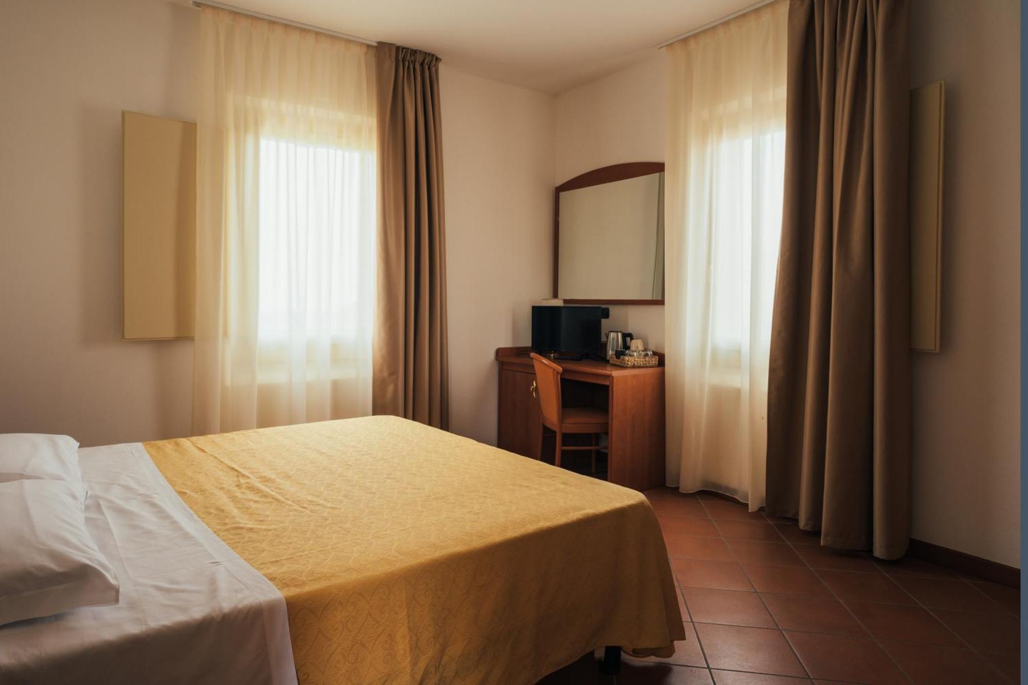 Albergo Cane ดอซซา ภายนอก รูปภาพ