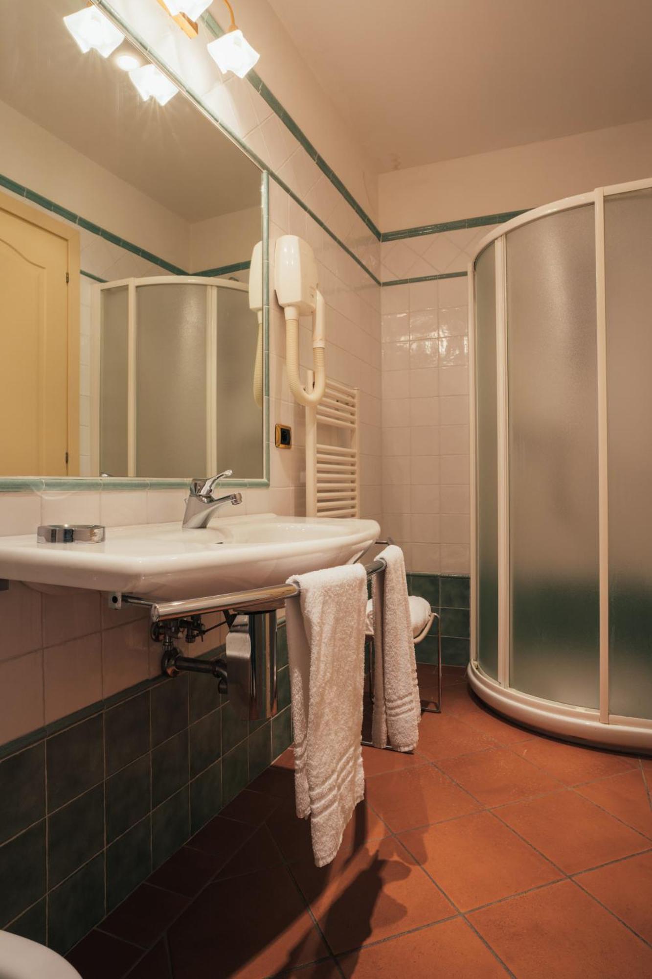 Albergo Cane ดอซซา ภายนอก รูปภาพ