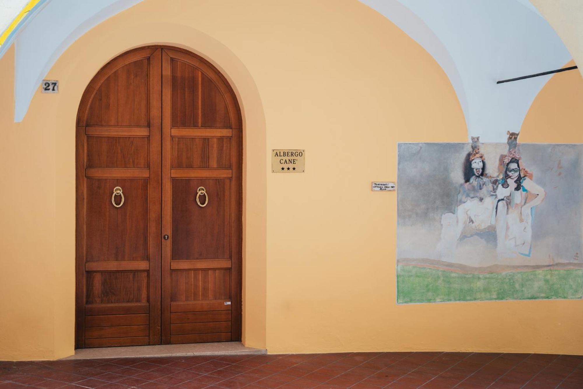 Albergo Cane ดอซซา ภายนอก รูปภาพ