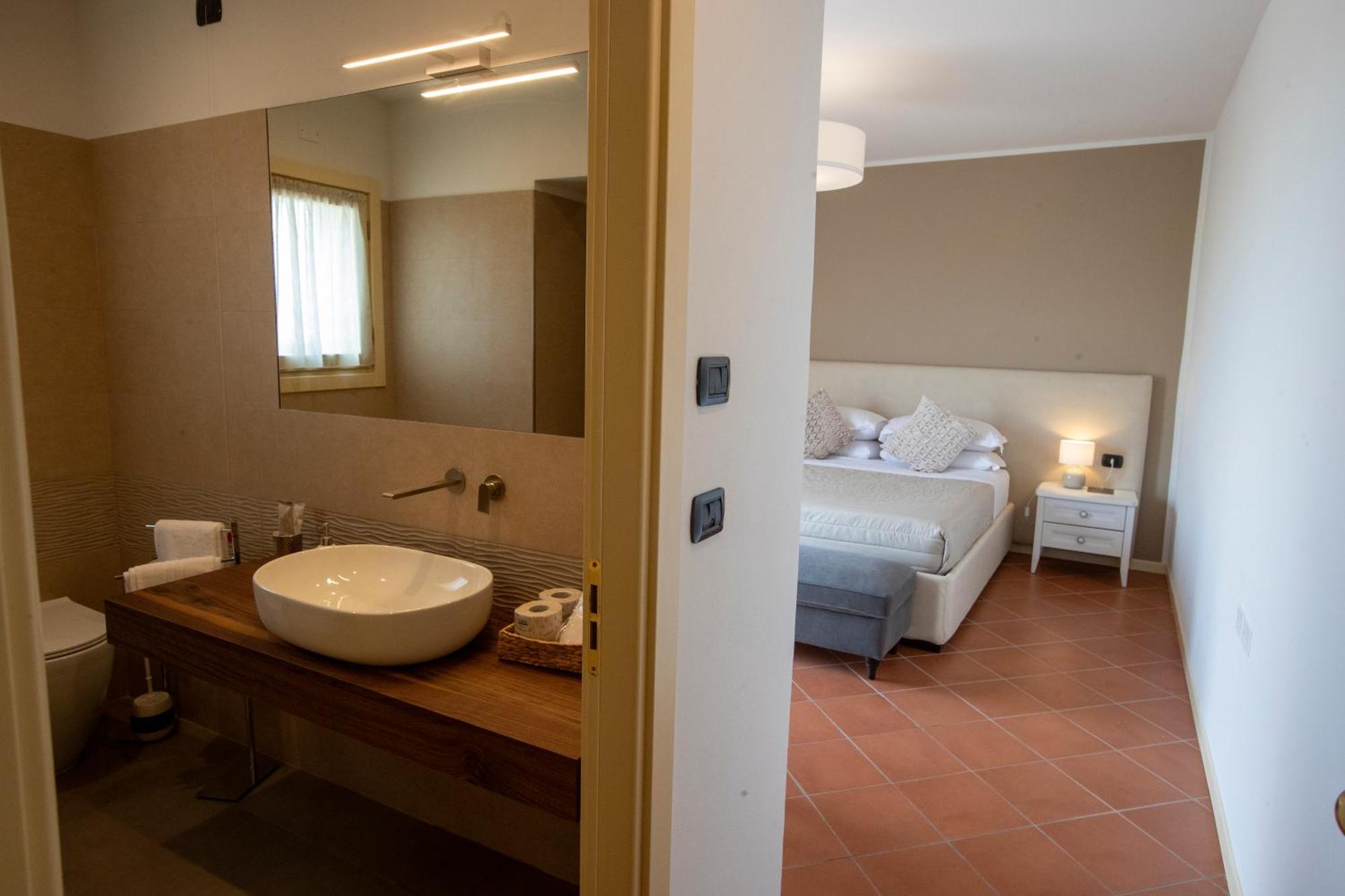 Albergo Cane ดอซซา ภายนอก รูปภาพ